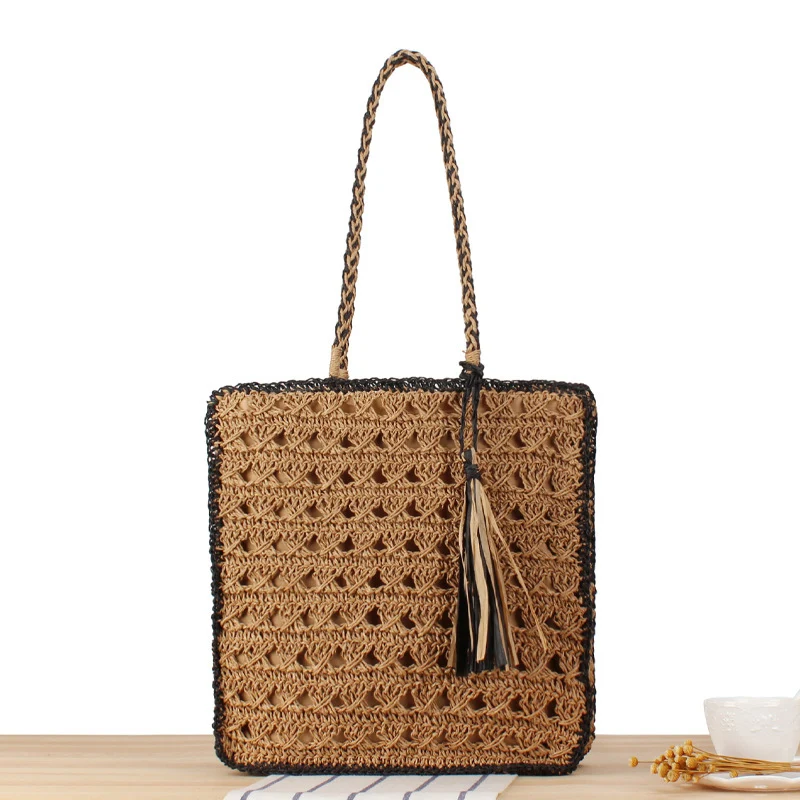 Handtasche aus handgewebtem Naturmaterial mit ansprechendem Fransen-Detail Skanto