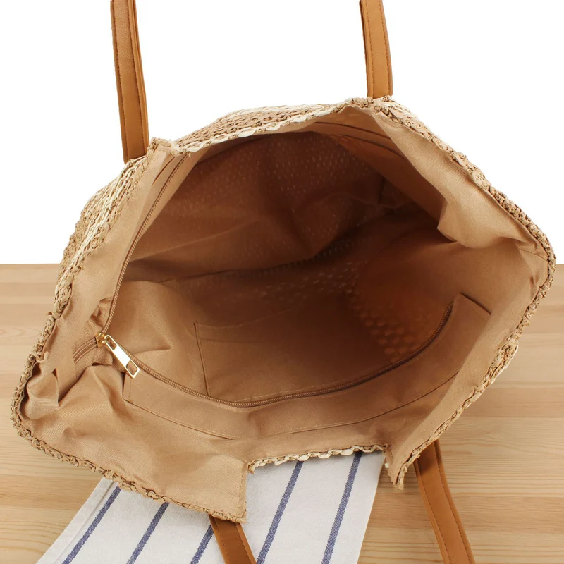Tote Bag aus geflochtenem Naturmaterial mit eleganten Ledergriffen Skanto