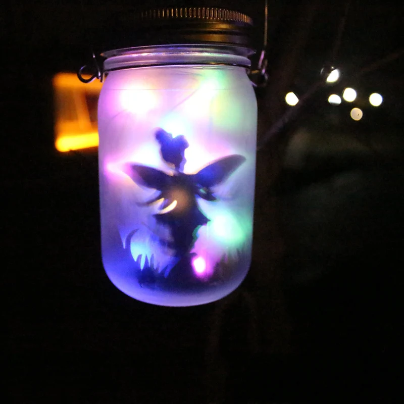 Solarbetriebene Milchglas-Feen-Silhouette-Mason-Jar-Laterne mit mehrfarbiger LED Skanto