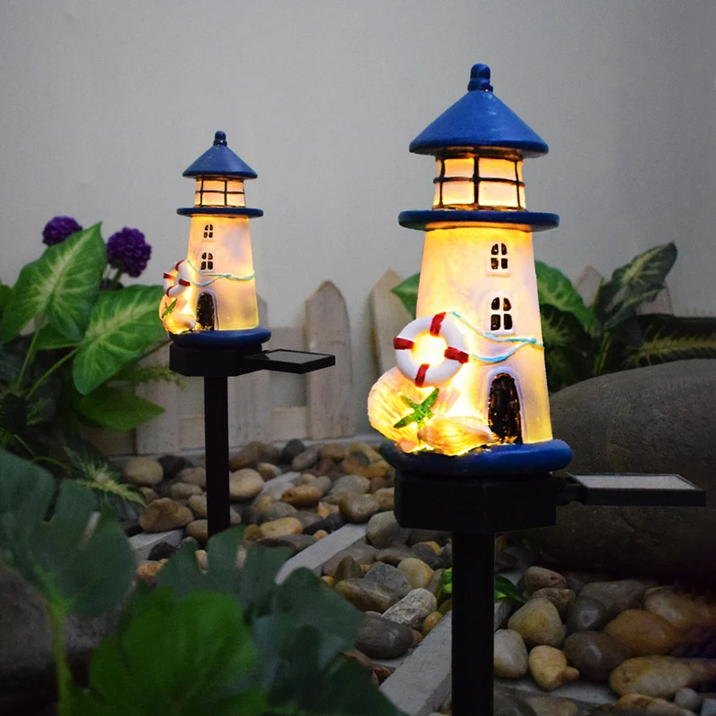 Solarbetriebene Leuchtturm-Gartenstecker-Leuchte mit warmer LED-Harz-Laterne und Dämmerungssensor Skanto