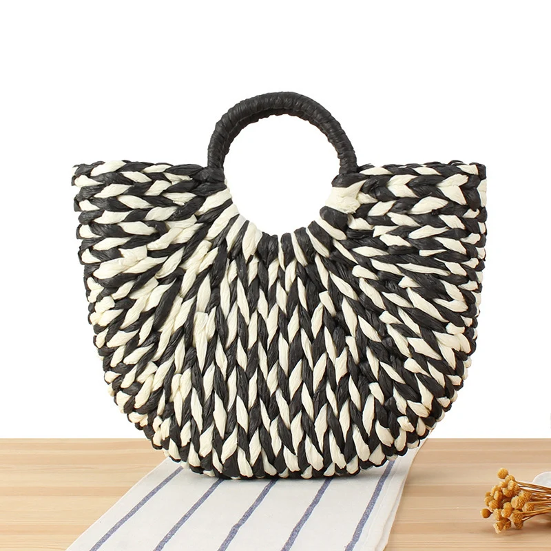 Handtasche aus handgeflochtenen Materialien mit modernem Design Skanto