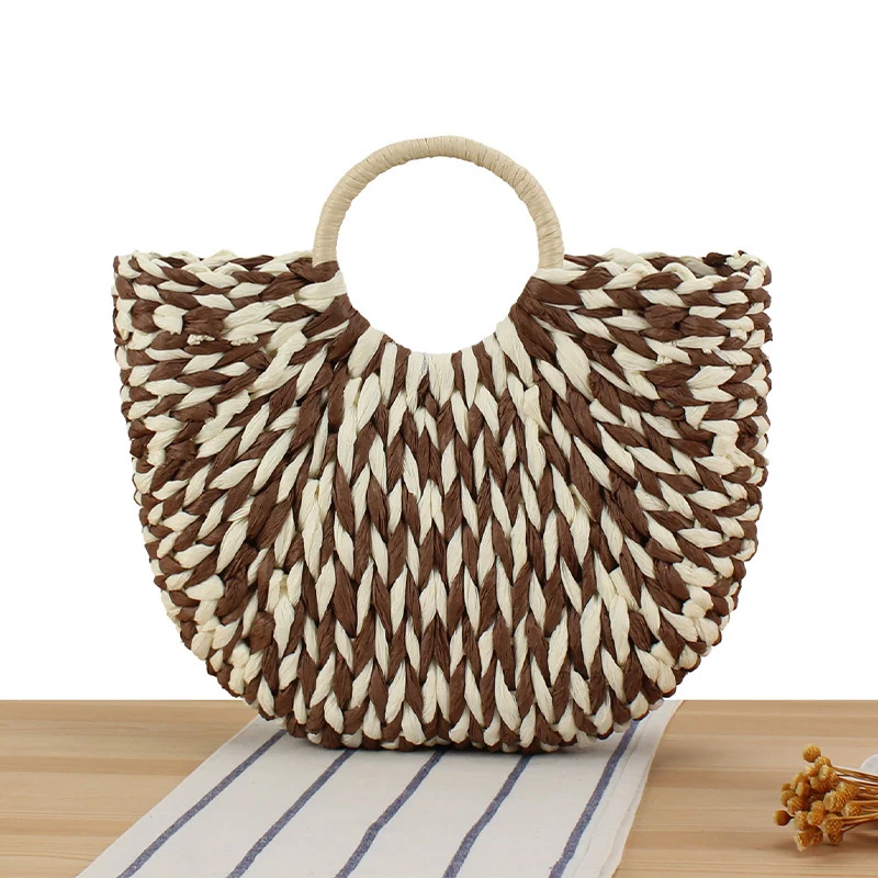Handtasche aus handgeflochtenen Materialien mit modernem Design Skanto