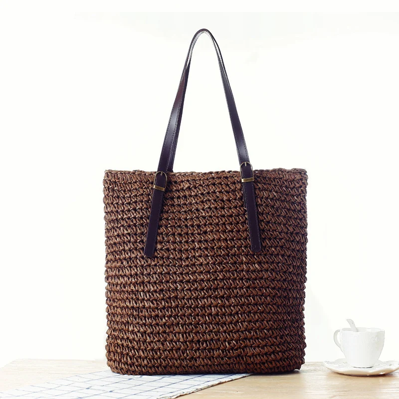 Handtasche aus handgefertigtem Naturmaterial mit robusten Ledergriffen Skanto