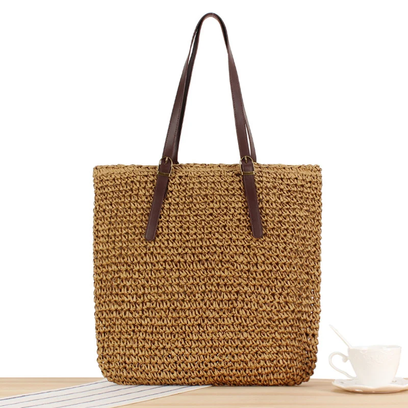 Handtasche aus handgefertigtem Naturmaterial mit robusten Ledergriffen Skanto