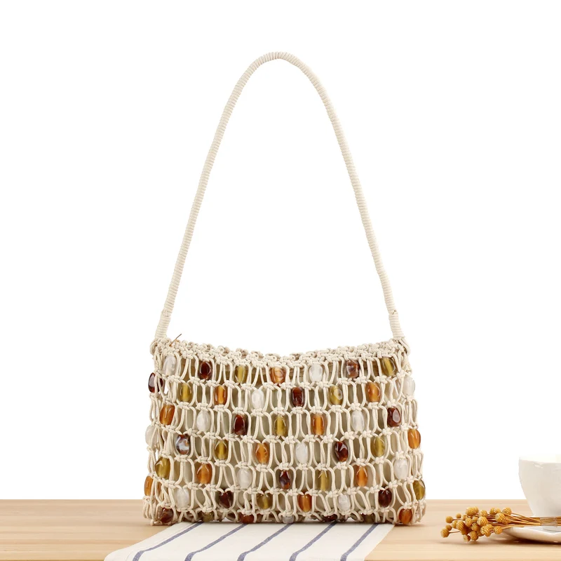 Beuteltasche mit bunten Perlen Skanto