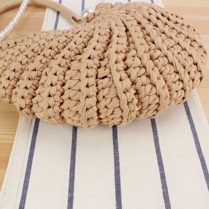 Abendtasche mit Perlenhenkel Skanto
