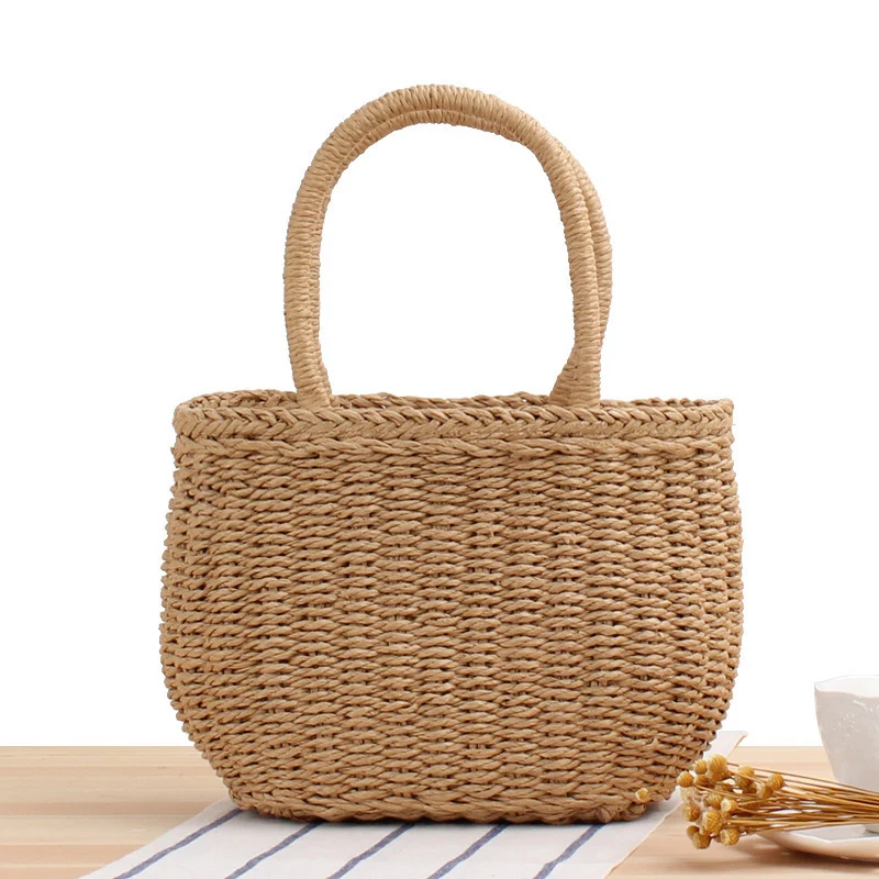 Handtasche aus geflochtenem Naturmaterial mit modernen Details Skanto