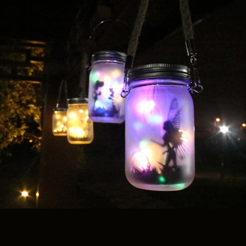 Hängende mattierte Mason Jar Solar-LED-Feen-Silhouette-Laterne mit Seilgriff und dynamischer LED-Lichterkette Skanto