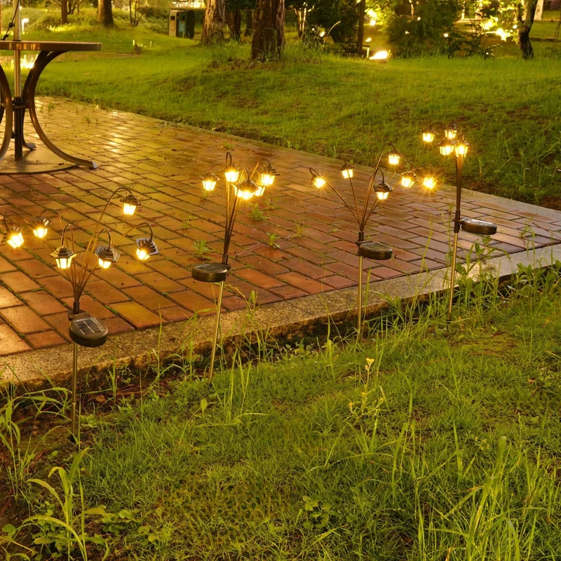 Dekorative Solar-Gartenstecker-Laternen mit mehreren Köpfen und warmem LED-Licht Skanto