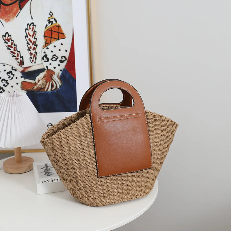 Moderne Korbtasche mit eleganten Lederdetails Skanto