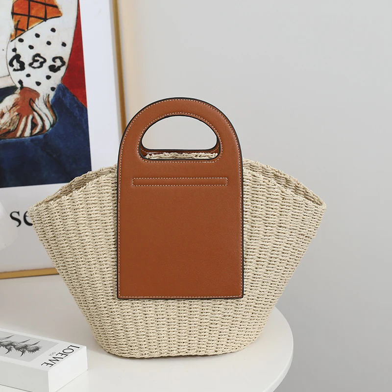 Moderne Korbtasche mit eleganten Lederdetails Skanto