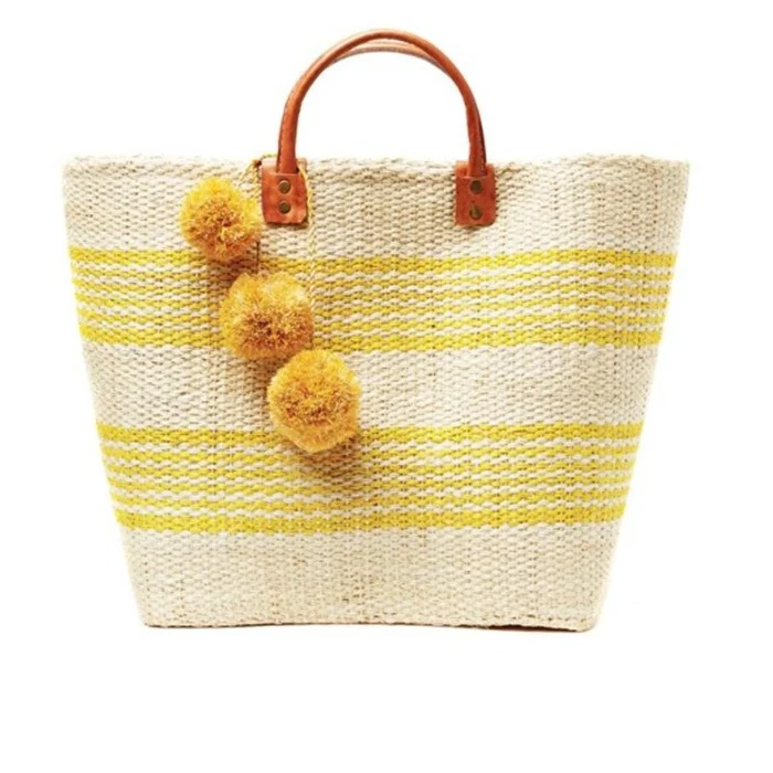 Stylische Strohtasche mit verspielten Pompons Skanto