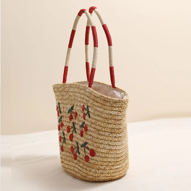 Handgemachte Korbtasche mit lebhaftem Blumenstickerei-Design Skanto