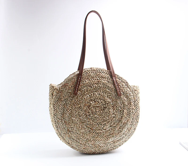Geflochtene Stroh-Strandtasche mit eleganten Ledergriffen Skanto