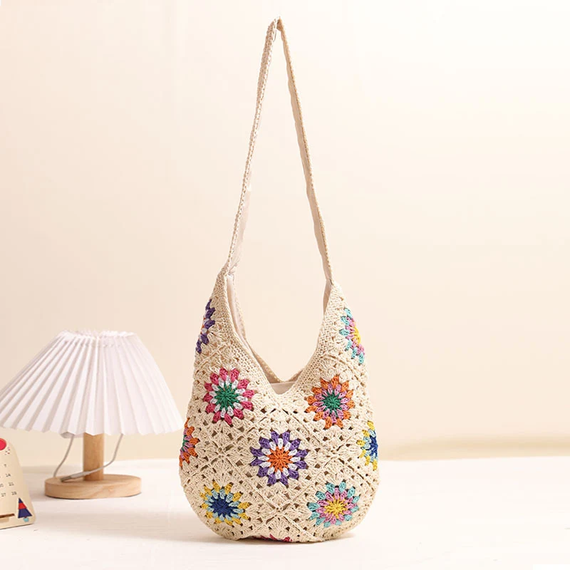 Handgemachte gehäkelte Tasche mit buntem Blumenmuster Skanto