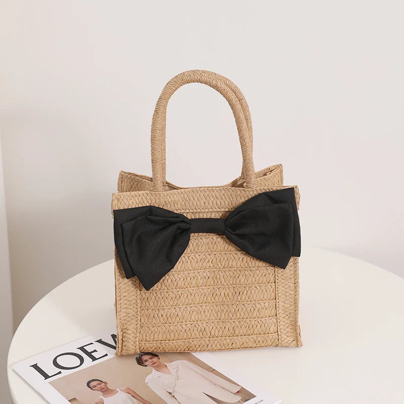 Elegante Strohtasche mit Schleifendetail Skanto
