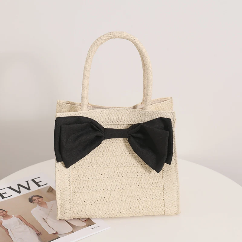 Elegante Strohtasche mit Schleifendetail Skanto