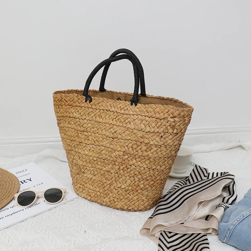 Elegante gewebte Tasche mit Kontrastgriff Skanto