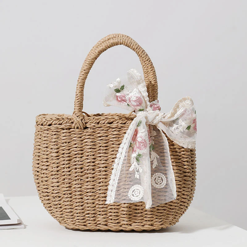 Elegante Strohtasche mit Blumen-Schleifendetail Skanto