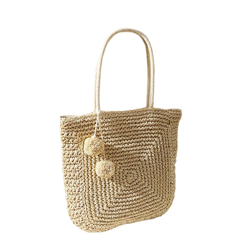 Handgefertigte Strohtasche mit Pompon-Details Skanto