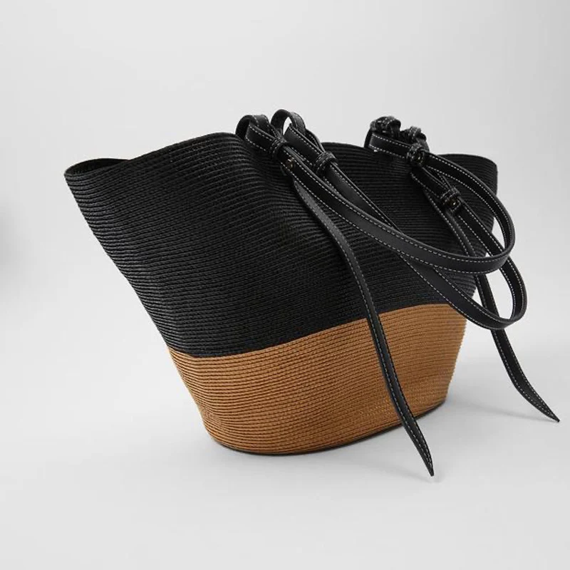 Geräumige Korbtasche mit eleganten Lederdetails Skanto