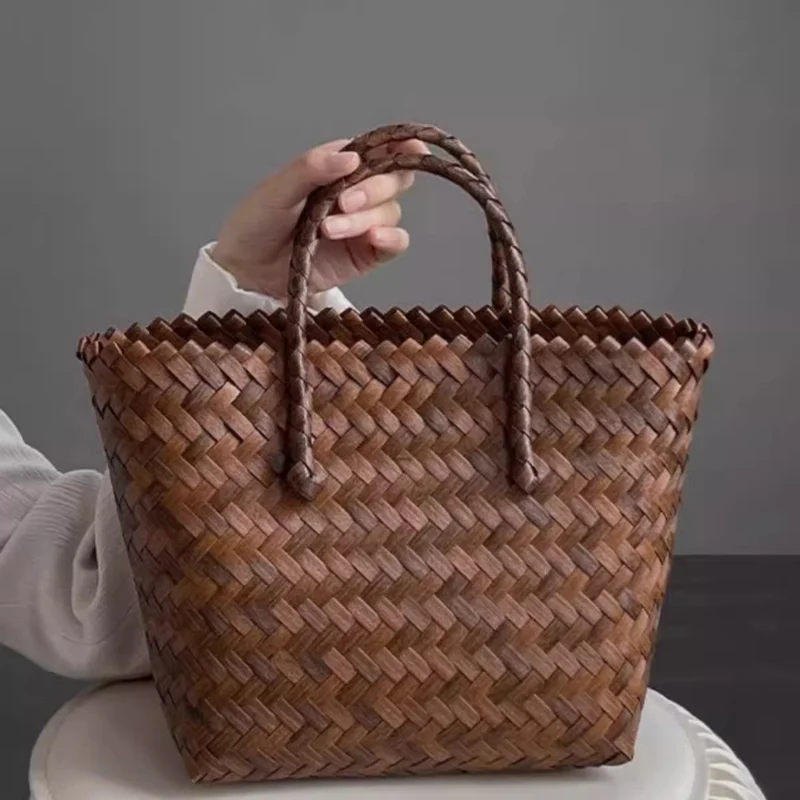 Handtasche aus gewebtem Material mit Bambusgriff Skanto