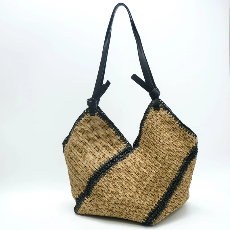 Moderne Strandtasche aus gewebtem Naturmaterial mit Ledergriffen Skanto