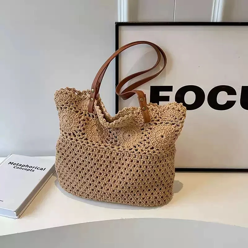 Gehäkelte Handtasche mit robusten Ledergriffen Skanto