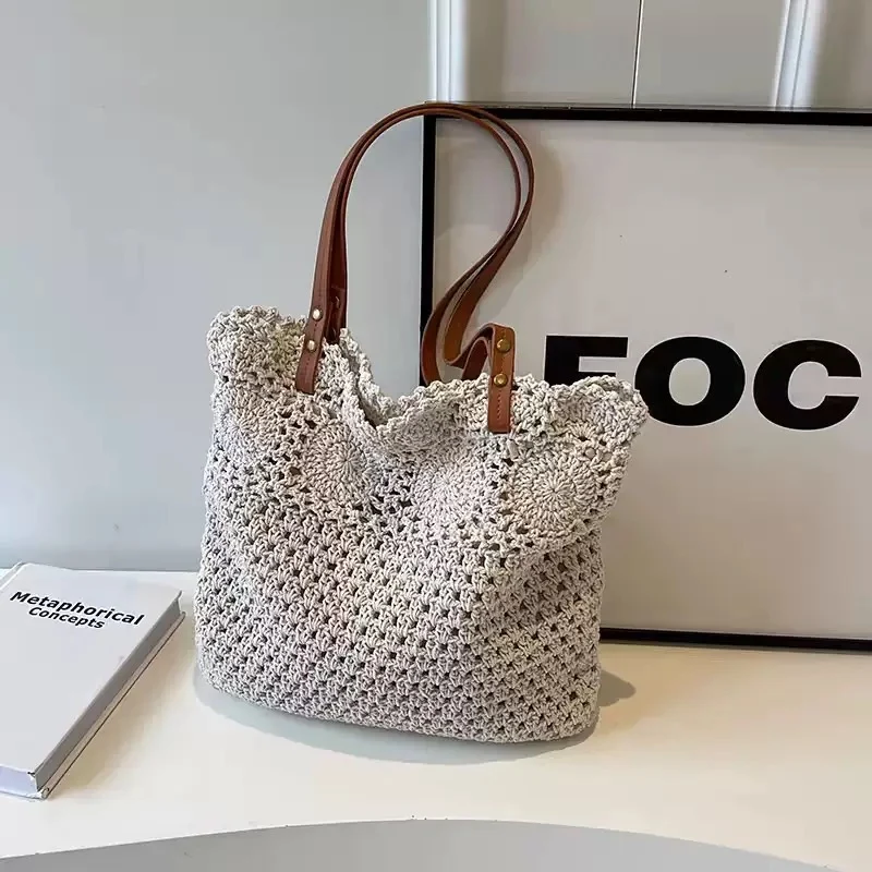 Gehäkelte Handtasche mit robusten Ledergriffen Skanto