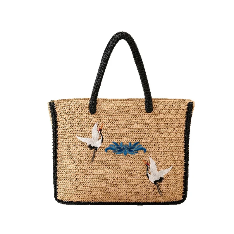 Elegante Stroh-Tote-Bag mit künstlerischem Stickdesign Skanto