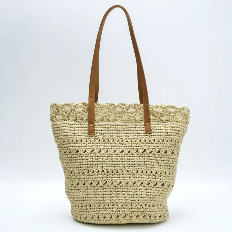 Handgewebte Tragetasche mit floralen Details Skanto