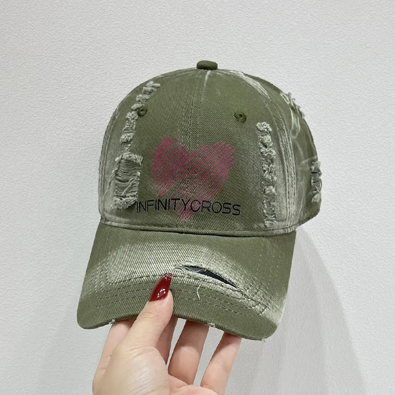 Damen Baseballkappe im Used-Look mit Herzstickerei, Skanto