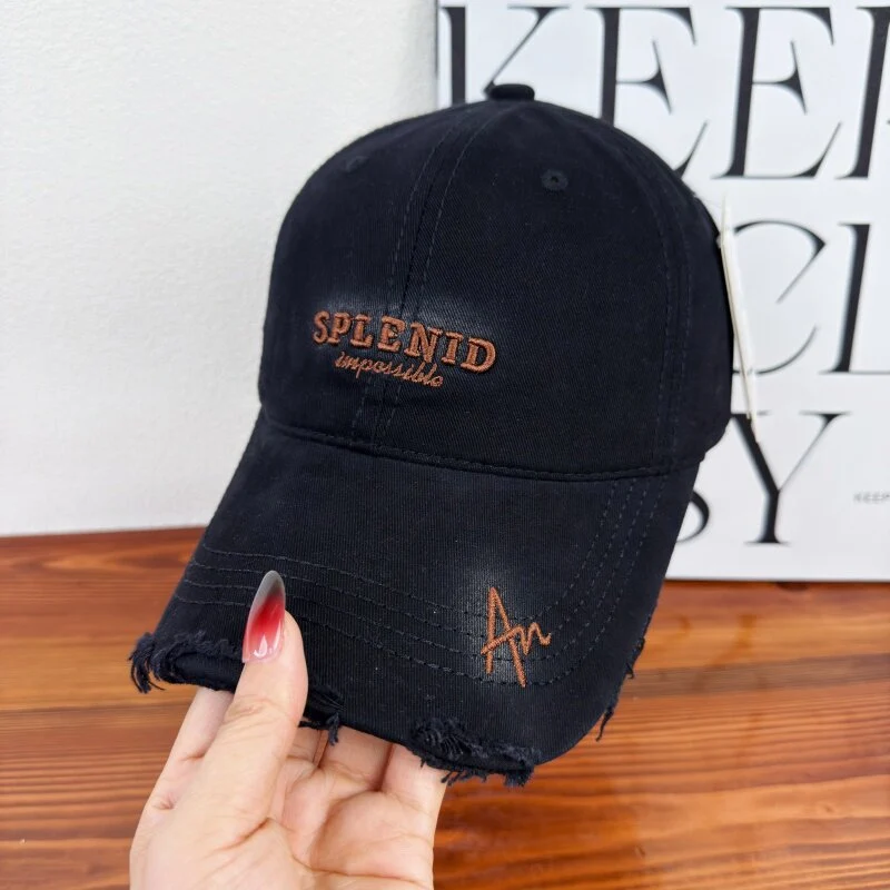 Damen Baseball Cap mit Grafik im Used-Look Skanto
