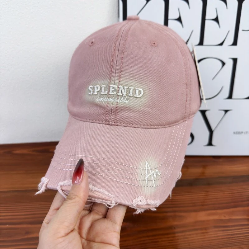 Damen Baseball Cap mit Grafik im Used-Look Skanto
