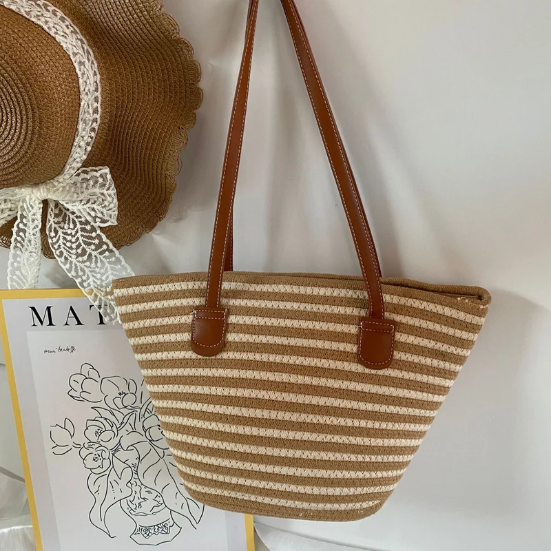 Elegante gewebte Tasche mit Ledergriff Skanto