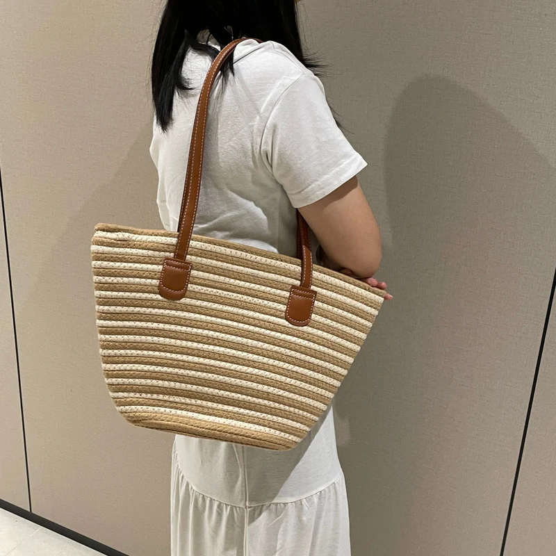 Elegante gewebte Tasche mit Ledergriff Skanto
