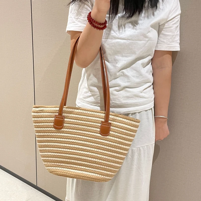 Elegante gewebte Tasche mit Ledergriff Skanto