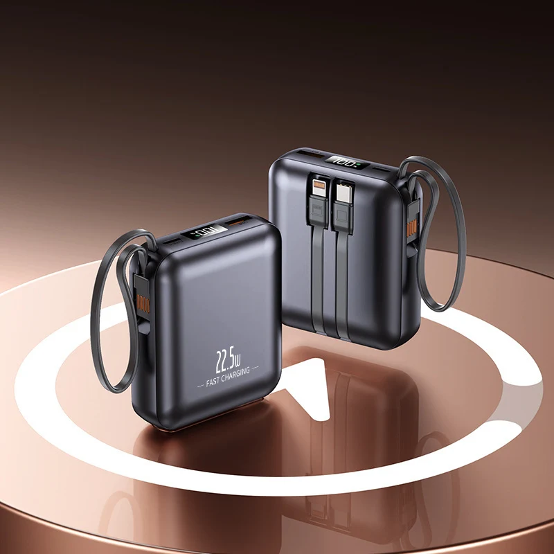Tragbare Powerbank mit Schnellladefunktion und integriertem Kabelsystem Skanto