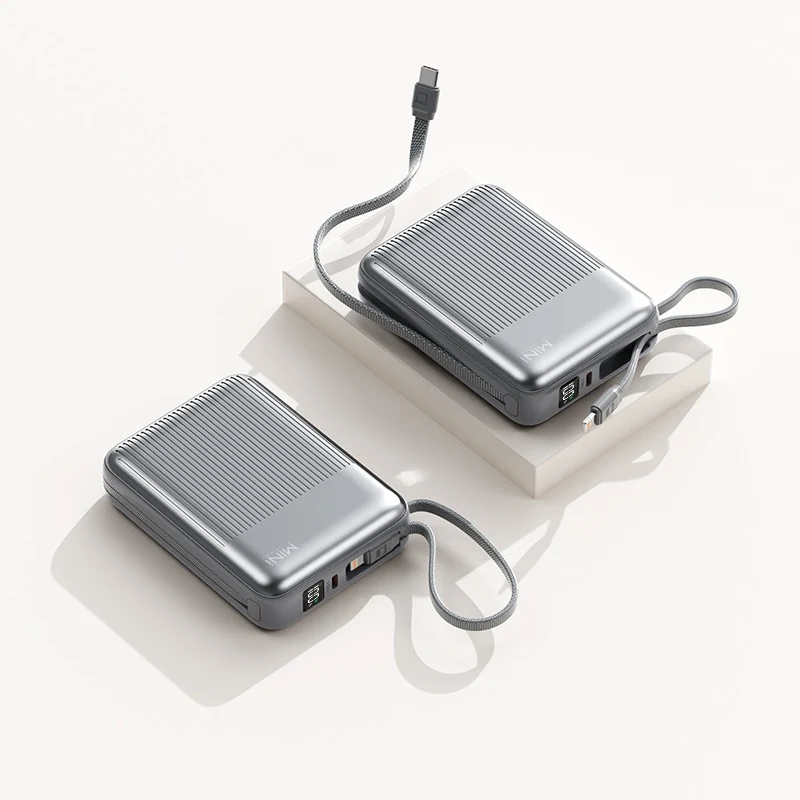 Kompakte Powerbank mit integriertem Kabelsystem Skanto