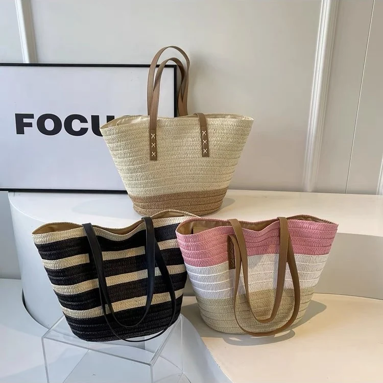 Geflochtene Strandtasche mit robusten Ledergriffen Skanto