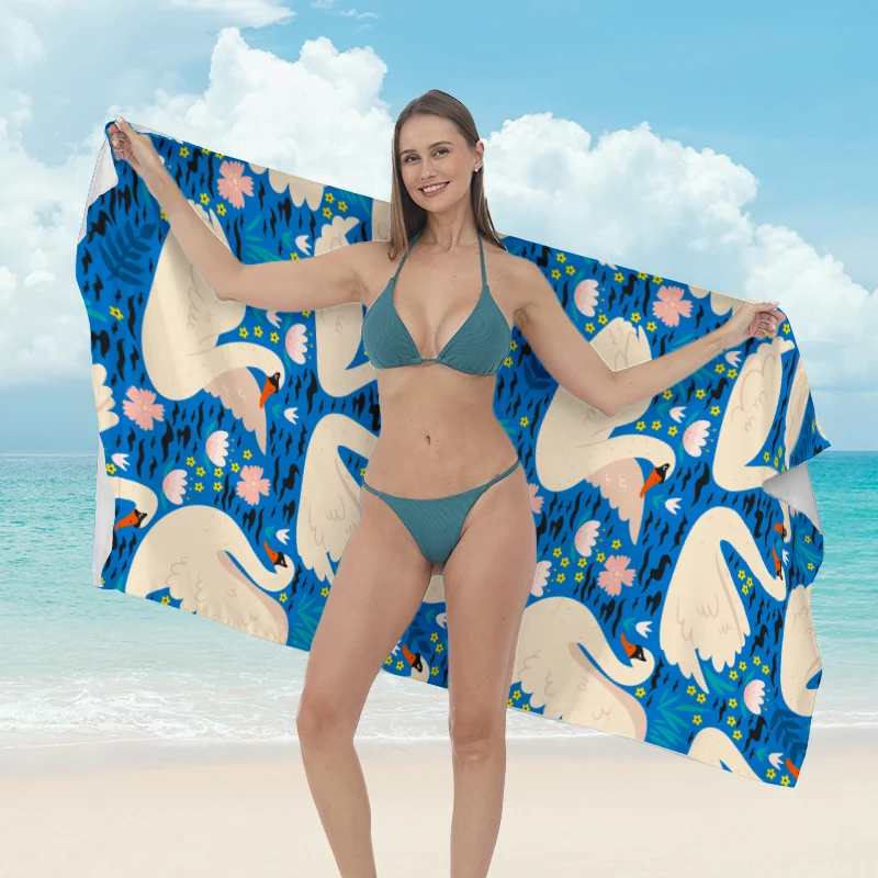 Strandtuch mit kreativen Surf-Motiven Skanto