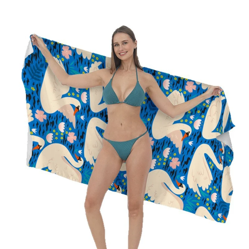 Strandtuch mit kreativen Surf-Motiven Skanto