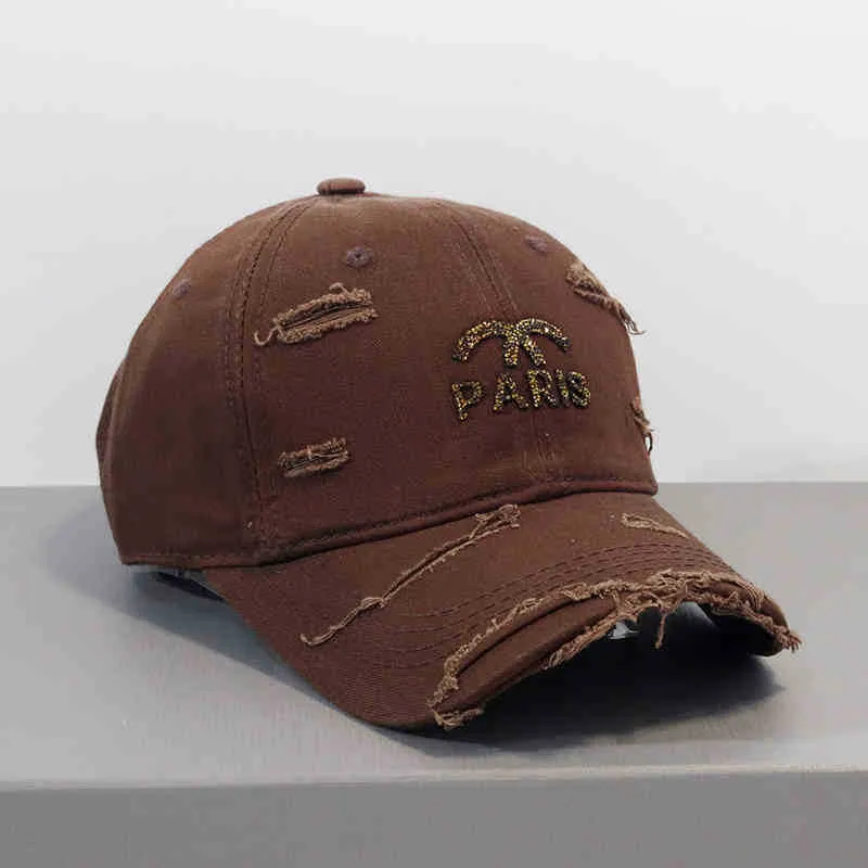 Damen Verstellbare Baseballkappe im Used-Look mit Grafik Skanto