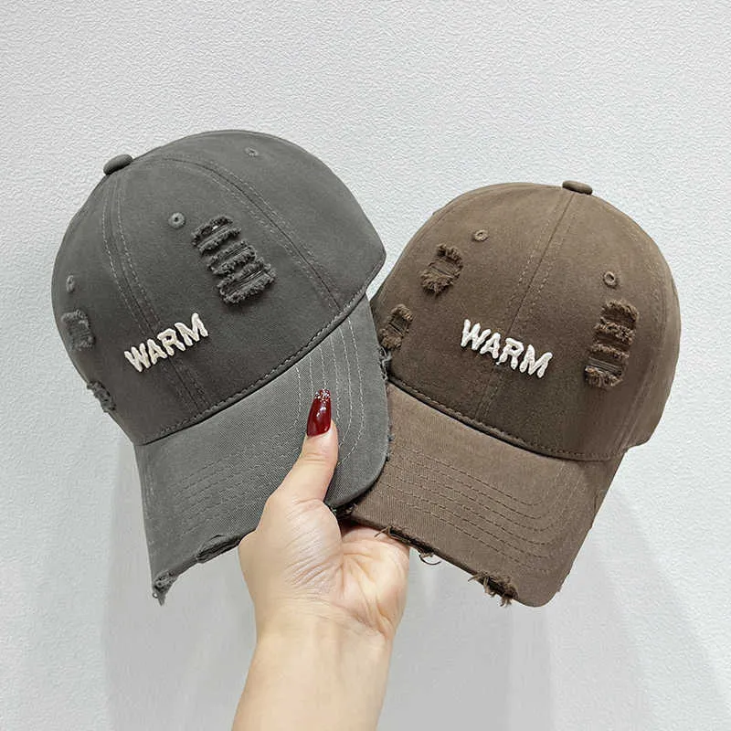 Damen Baumwoll-Cap im Used-Look mit gestickter Botschaft Skanto