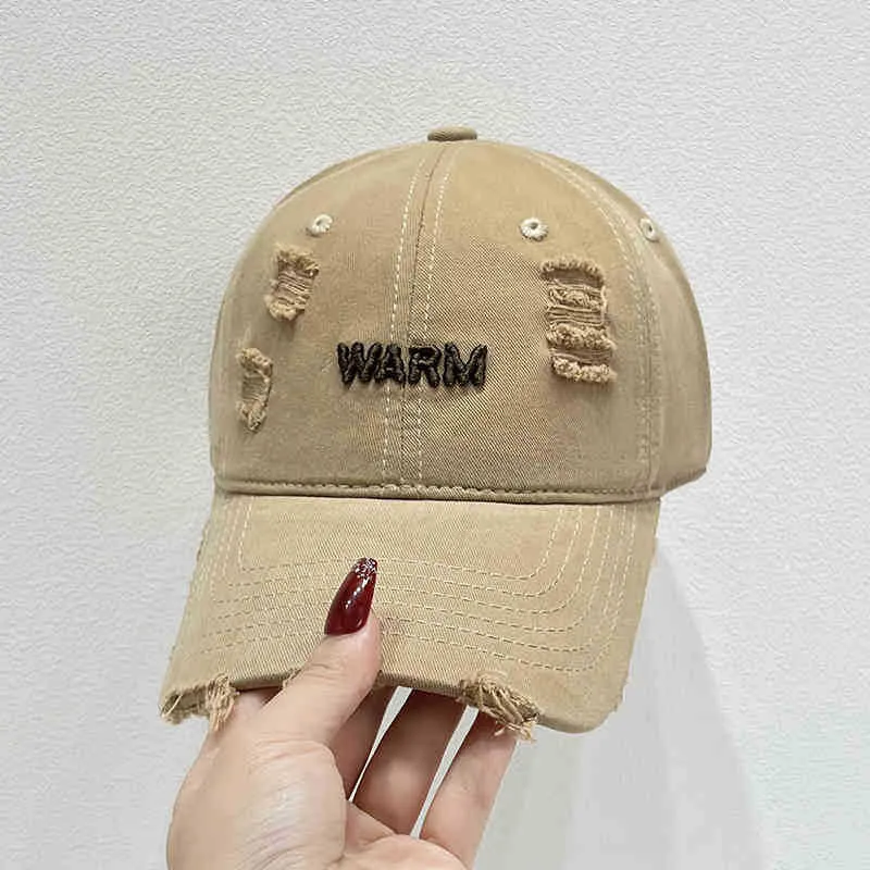 Damen Baumwoll-Cap im Used-Look mit gestickter Botschaft Skanto