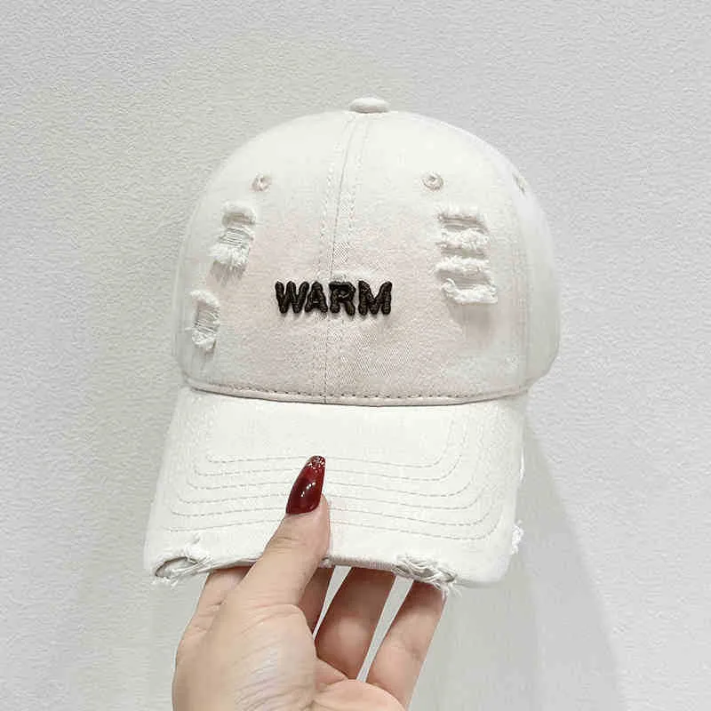Damen Baumwoll-Cap im Used-Look mit gestickter Botschaft Skanto