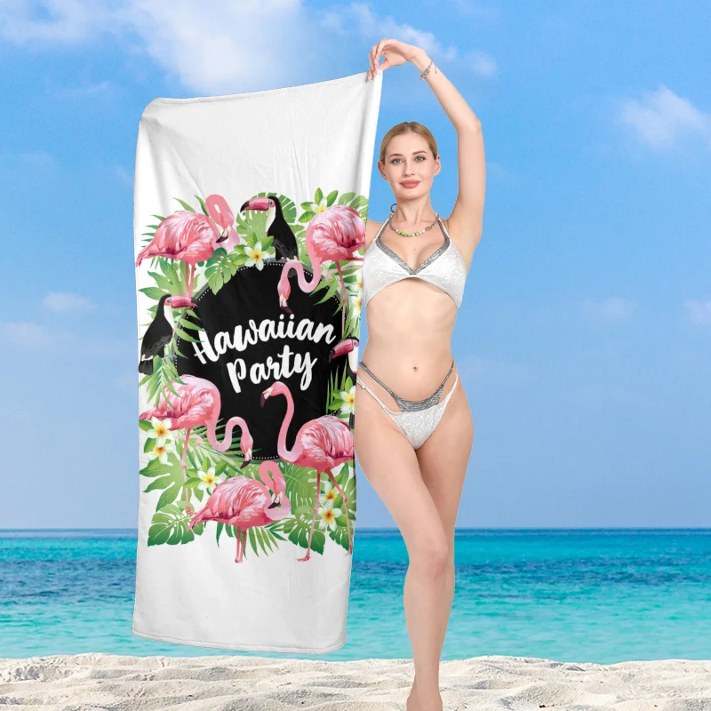 Elegantes und funktionales Strandtuch mit tropischem Flamingo-Design Skanto