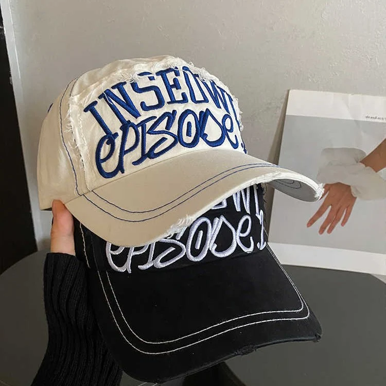 Damen bestickte Cap im Used-Look mit künstlerischem Motiv Skanto