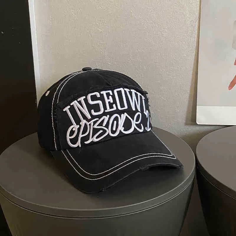 Damen bestickte Cap im Used-Look mit künstlerischem Motiv Skanto