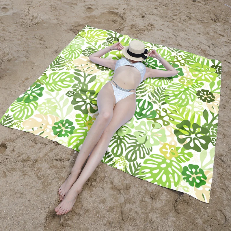 Stranddecke mit tropischem Blumendesign Skanto